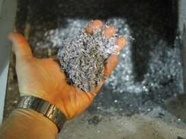 I will be remembered at Taurus as the idiot who took a handful of twisted razorblade like shavings out of the hopper to take a picture of them. 