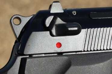 In Defense of the Beretta M9 The safety moves up to fire. When racking, be sure you don't accidentally pull the lever down.