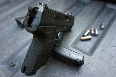 The gun comes with low profile 3 dot sights. 