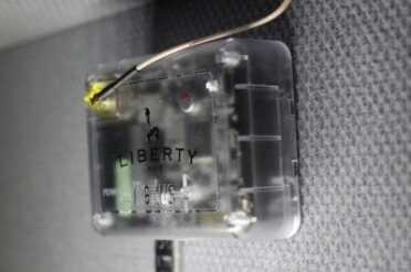 The box sticks inside the safe on hook-and-loop fasteners.