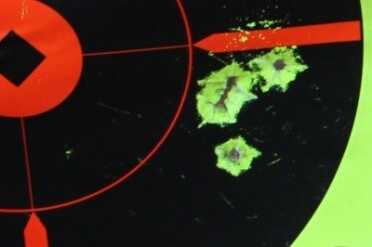 Five from 10 yards. I was shooting a stick-on dot that was shot off. 