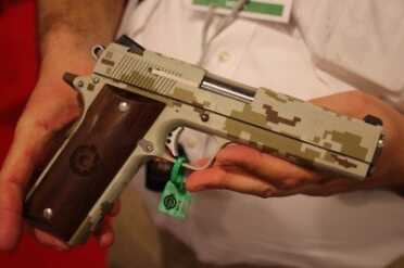 Coonan's Kicking Compact .357--SHOT Show 2015 They offer all sorts of different finishes. Don't drop this one in the sand, you will never find it.