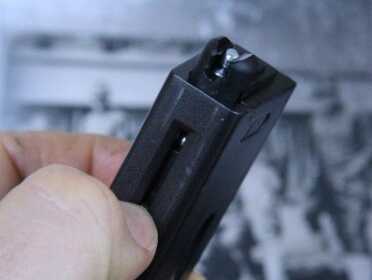 9 Broomhandle Mauser is Full Auto! - No Grownups Allowed! The magazine is 18 rounds and fits only BBs. You have to load them one at a time.