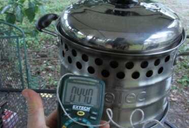 Prepping 101: Rocket Stove Cooking - The Fuel Miser The temperature probe read over 400 degrees in the smoke diffusers once the whole thing was put together properly and working.