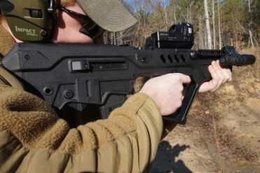 Israel Defense Forces IWI Tavor Review Ejection happens here, over your arm.