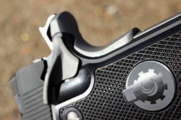 The grip is milled to allow the safety to drop freely.