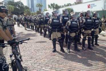 With respect to this photo, don't read too much into it.  GunsAmerica is not anti-police or anti-law enforcement.  (Photo: TheUSIndependent)