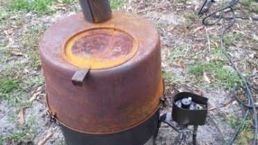 This is what the stove looks like after a twelve hour burn and a light rain. When you heat carbon steel and burn off oil, it rusts. Some stove black paint might be in order.