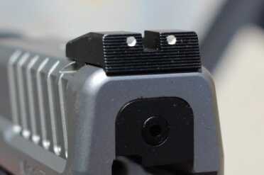 The sights are functional and adjustable.