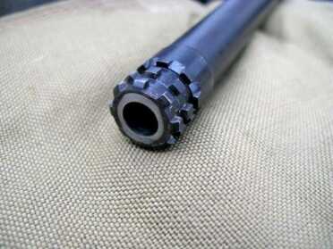 While it might not look like much the locking lugs on the AUG's barrel allow it to lock back in place the same way every time for excellent zero retention.