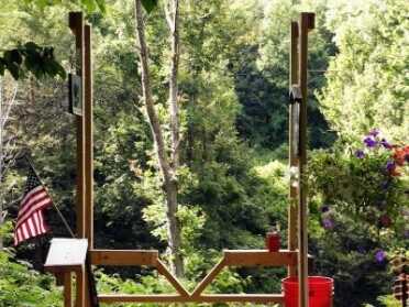 why Sporting Clays is one of America’s fastest growing sports. A typical station, this is the “box” from which you shoot.