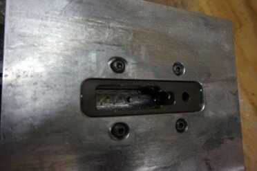 The jig has a plate to help support the router.