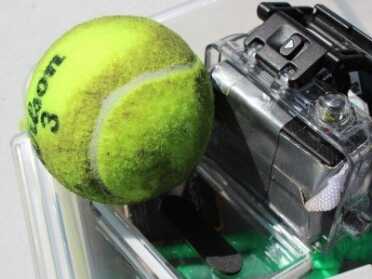Best Fun-Gun Ever. The Can Cannon - Mounts on AR-15 Tennis balls get singed. This one has been shot once.