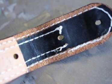 The liner helps the leather hold its shape. The combination of materials makes the belt less prone to stretching and warping.