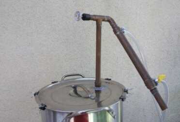 This type of still has a column that turns downward, through a cooling jacket, as opposed to a coil.