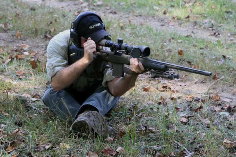 Shooting in alternate positions  such as the sling supported as shown almost require breaking the shot at the natural respiratory for accuracy.  Holding your breath is not the way to go.