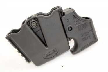 The magazine loading tool clamps onto the rail segment on the magazine carrier so it's readily available at the range.