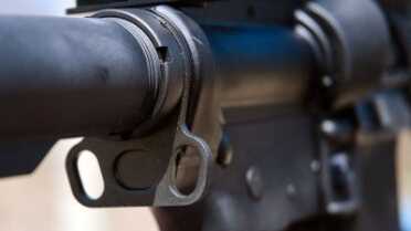 Right and left attachment points are located just at the front of the buffer tube. Great place to clip on a single-point sling.