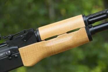 The wooden furniture, maple in this case, gives the RAS-47 that traditional look. Polymer furniture is also available from makers like Magpul and others.