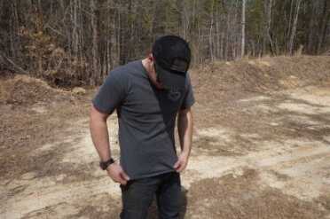 Dark clothes and crazy-ass plaids help hide guns.