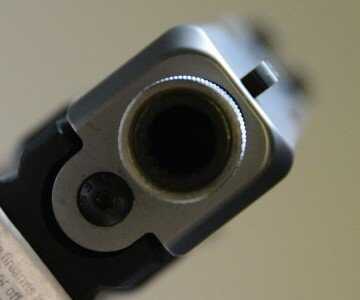 Low sights are a solid choice for holster carry, but disappear when you put on a can.