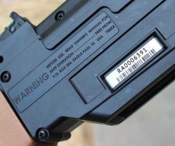 Serial numbers are engarved on a plate secured to the plastic shell.