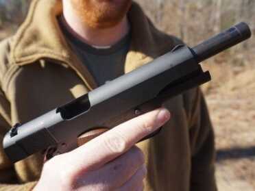 Auto Ordnance 1911A1 Review The parkerized finish helps hold oil and cut glare.