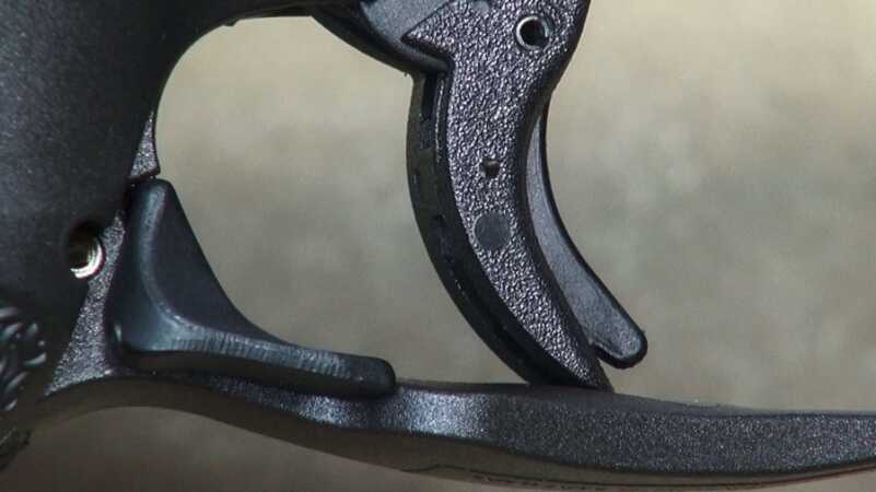 Polymer trigger incorporates a dongle-style safety lever. Note the tiny (but quite irritating) burr at the toe.