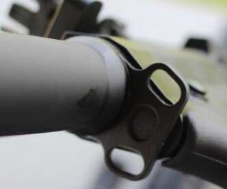 The pistol has a sling plate for a hook sling.