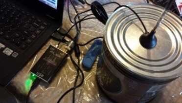 This is a tip from the book I didn't see online. Use a metal "ground plane" like this coffee can, to improve the reception of whip antennas. It works great. 