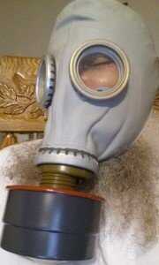 I took this picture to illustrate a few misconceptions. One is that the sizes on the GP-5s are absolute. This is a size 3, or "large" mask, and my head measurement is 73" inches. 