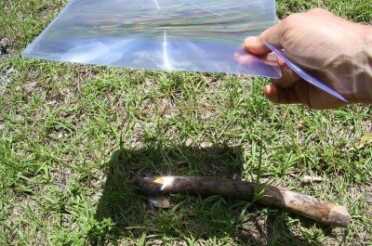 The large magnifier could light anything even slightly dark colored. The military firestarters didn't even get warm though. This stick burst into flames in like 5 seconds in the direct Florida sun. 