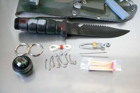 Now this is a fighting knife. I had one just like it. I actually had ten, at least. They don't age well. But to hell with prepping! This thing has everything you could ever need for serious long term survival.