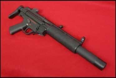 MP5 SD shown with factory collapsible stock. Suppressor screws onto barrel that has slots cut into it this allows all 9mm fired to be subsonic. 