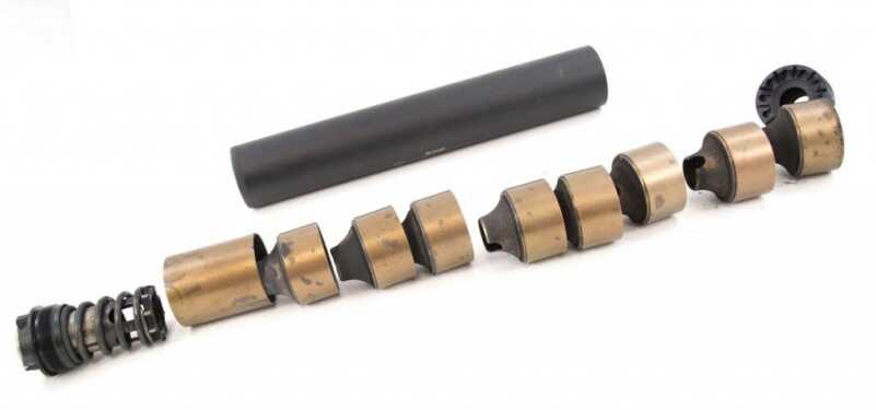 How Silencers Work Modular designs create baffle space using interlocking pieces like on this .45 ACP pistol silencer.