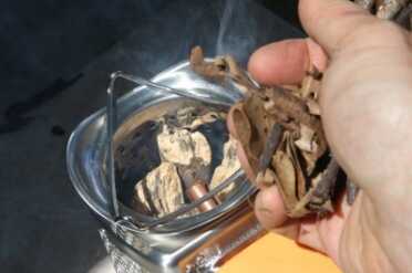 See below for my pictures. The big difference for me with the Biolite stove compared to a real Rocket Stove is that the internal battery runs a blower, and that blower helps you to light the stove easily with ground pick up tinder, and burn large chunks of damp ground wood with no problems at all. 