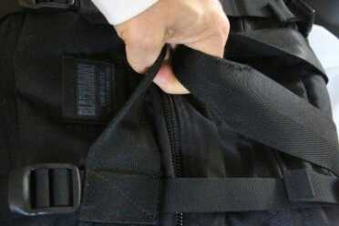 I prefer the Blackhawk top carry system as compared to the Chinese pack, which incorporates the shoulder harness. The Blackhawk also has a waist belt, which makes a big difference if you are dragging someone. 