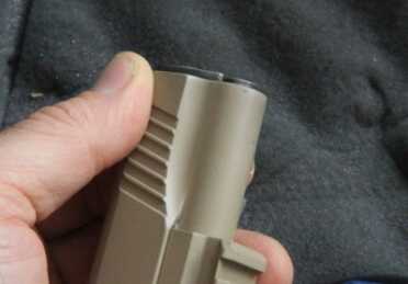 You will see a halo of carbon on the front of this gun after you shoot it, but I found that the carbon rubbed right off without solvents. 