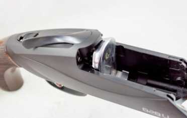 Benelli 828U--The Future of the Over-Under Shotgun Note the floating steel locking plate in contrast the aluminum receiver.