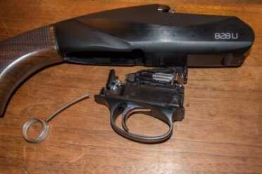 Benelli 828U--The Future of the Over-Under Shotgun Trigger group removal is easy provided you follow the instructions carefully.