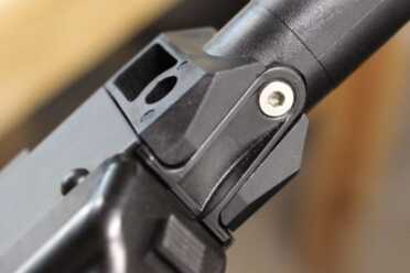 The stock slides onto this receiver extension. 