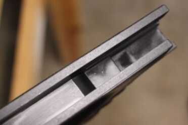 The inside of the stock's slide.