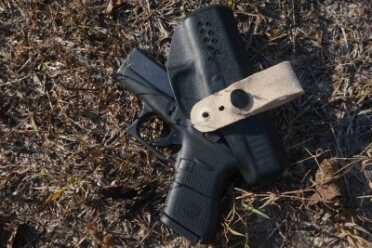 Slide in the back, then ease in the front.