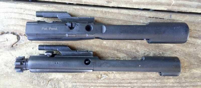Gemtech Suppressed Bolt Carrier (top) and standard carrier (bottom)