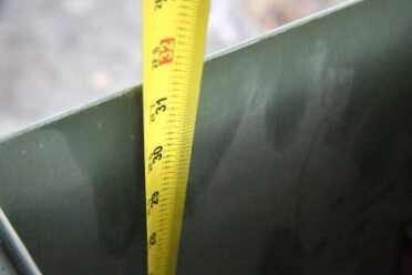 The box can don't fit a lot of barreled actions, let alone fully assembled actions.