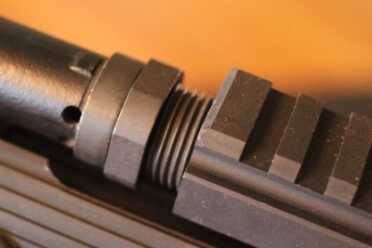 Install the new top rail. This replaces the gas tube and fits in place easily.