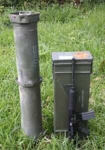 These are the two containers, with the rifle in there to show the relative size. For absolute indestructibility the cylinder has the upper hand, but at the cost of cubic inches of storage. 