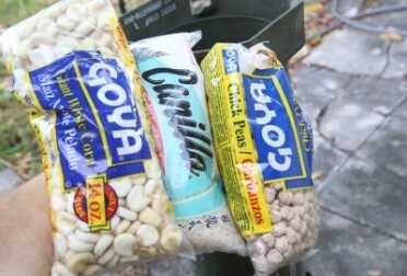 The one pound bags of beans and rice are much better for the cylinder container. You can get away with 5 lb. bags in the box can. 