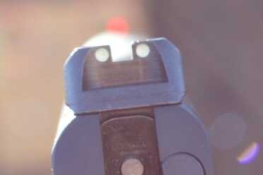 The orange stands out well between the white dots. 