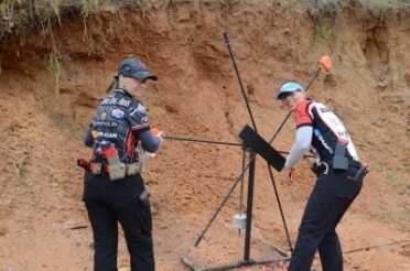 Sky Killian and Rebecca King, setting a star with clays during filming of The Big Gun, in SC. 
